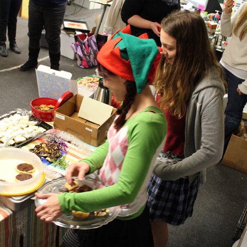 Carla and Ember picking out cookies